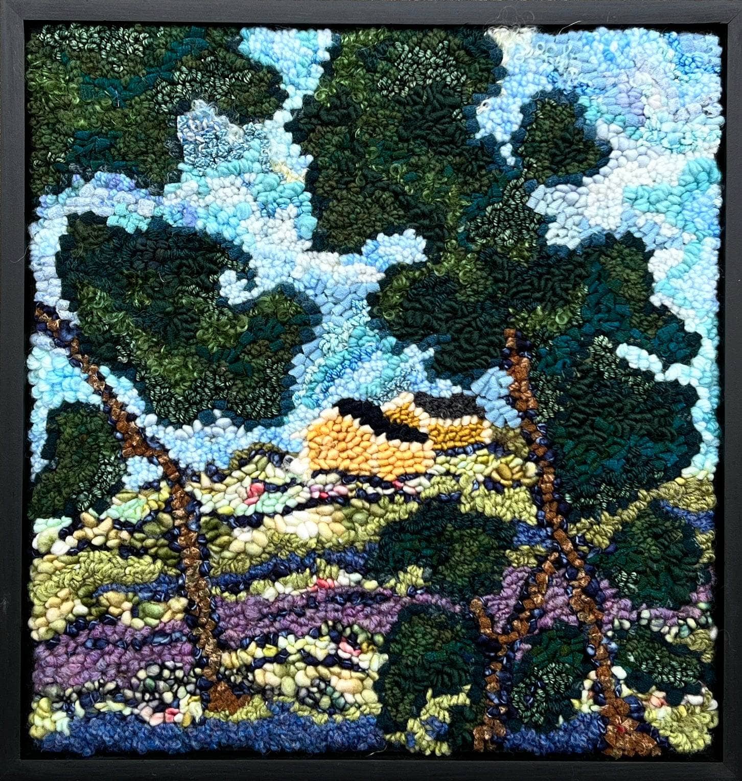 update alt-text with template Yellow house beyond the valley 15” x 14.5” Framed-Deanne Fitzpatrick Rug Hooking Studio-Rug Hooking Kit -Rug Hooking Pattern -Rug Hooking -Deanne Fitzpatrick Rug Hooking Studio -Is rug hooking the same as punch needle?